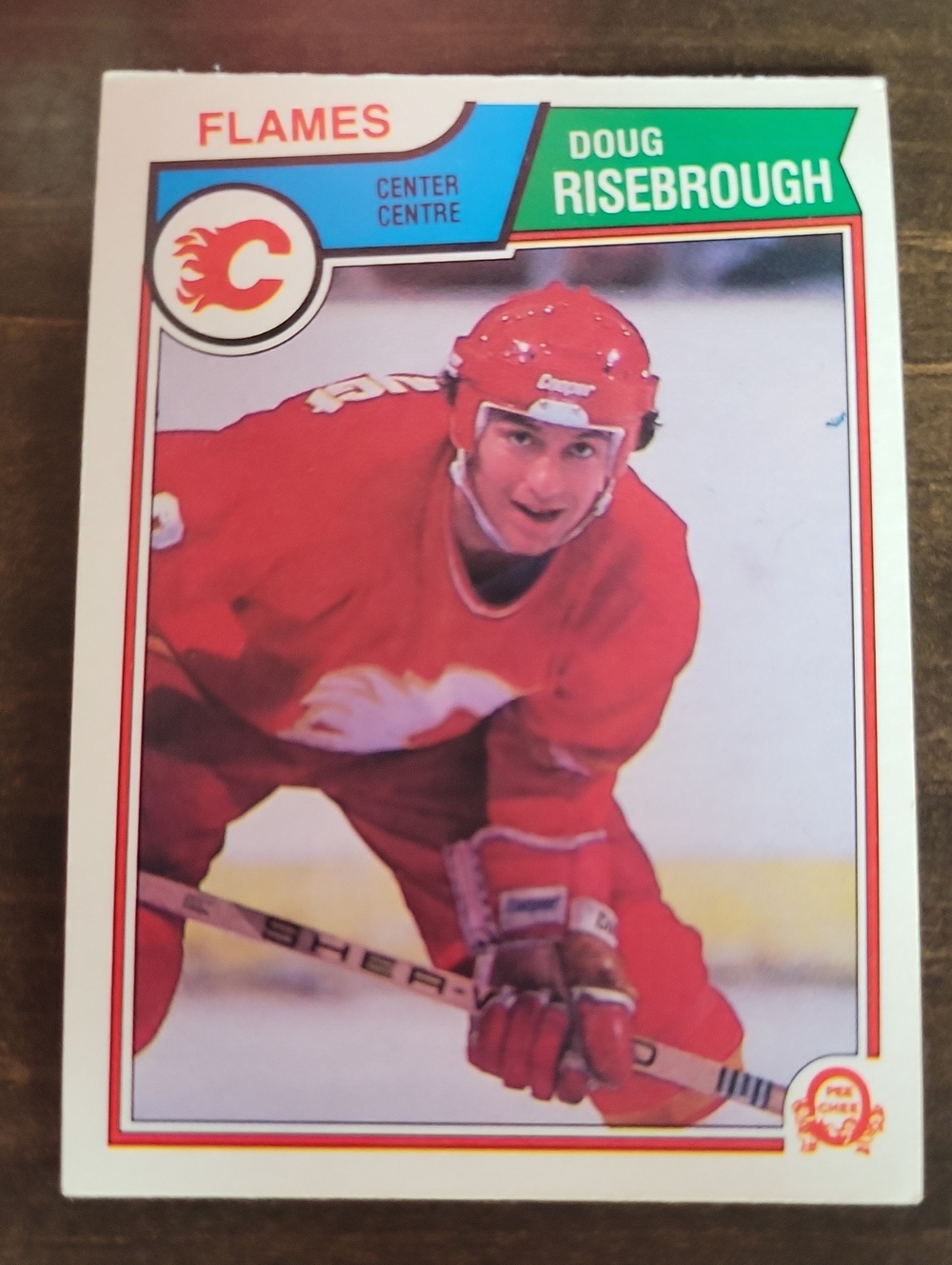 1983/84 OPC Calgary Flames Doug Risebrough Hockey Card - Red/White